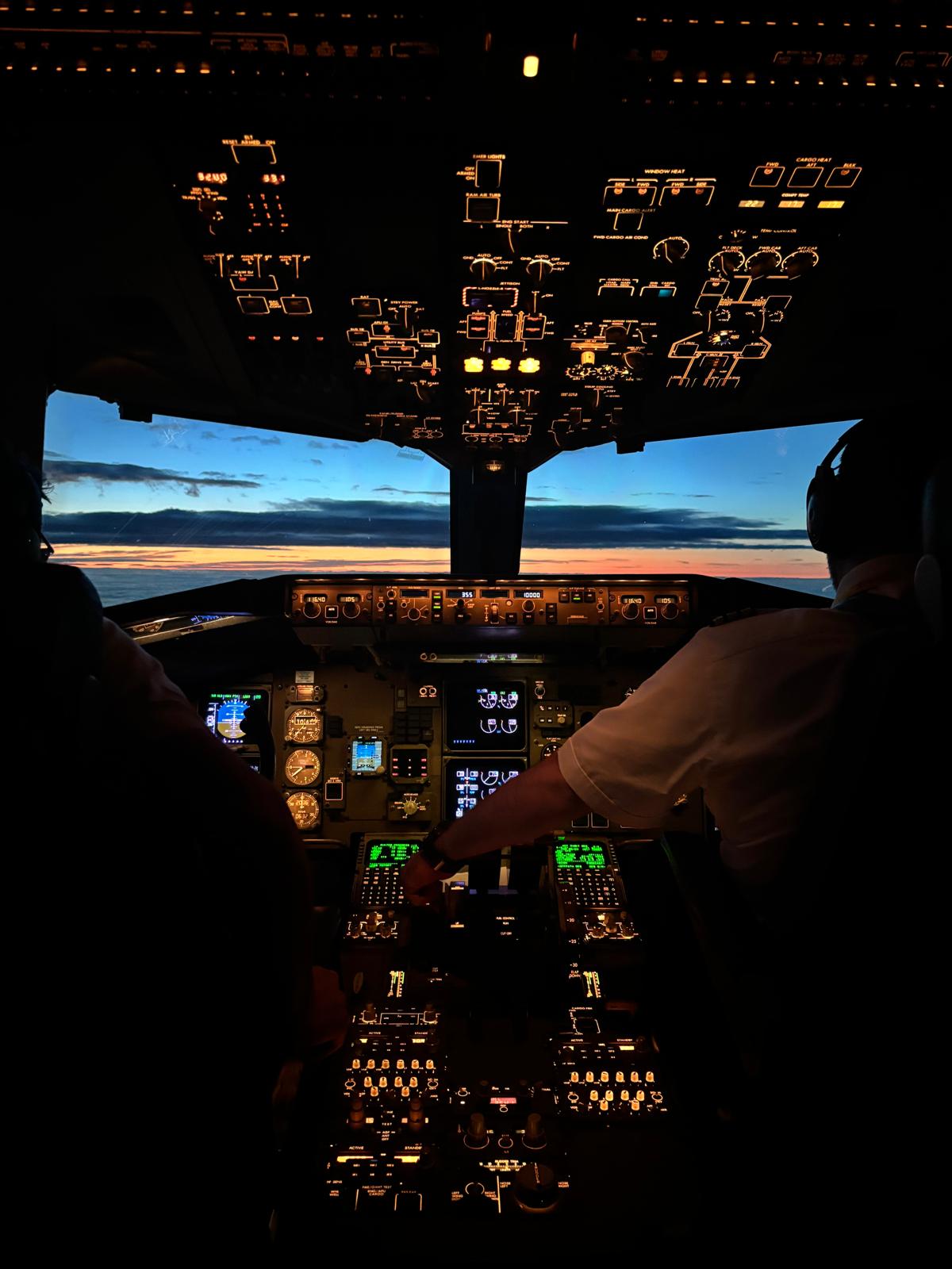 Aircraft on tarmac at night